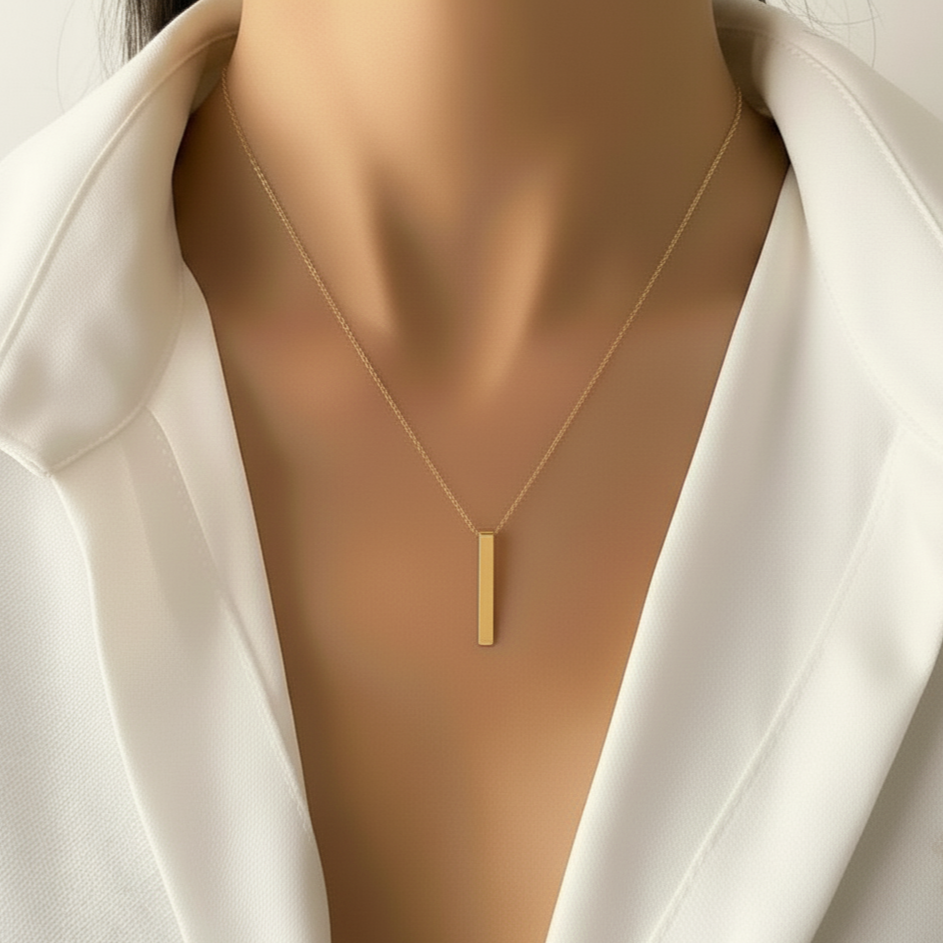 Gold necklace on a model with a white shirt