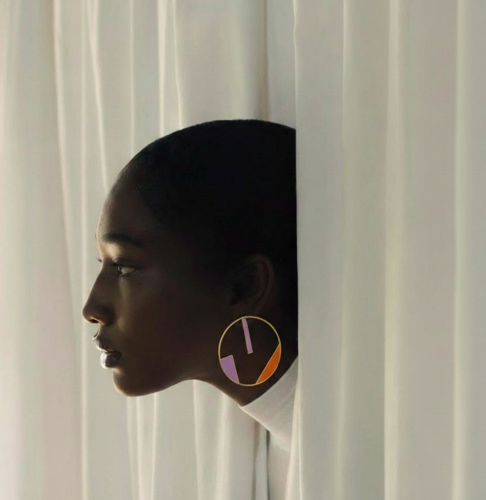 Woman wearing colorful earrings