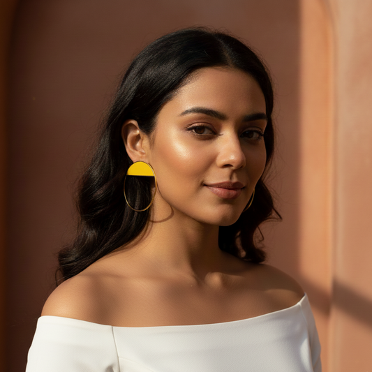 Woman wearing limelight earrings