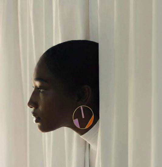 Woman wearing colorful earrings